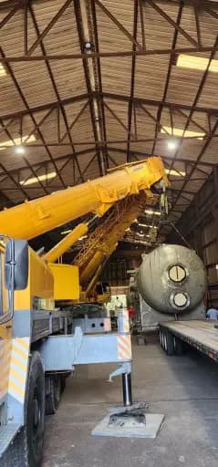 80 Ton Crane moving water cooler inside a building