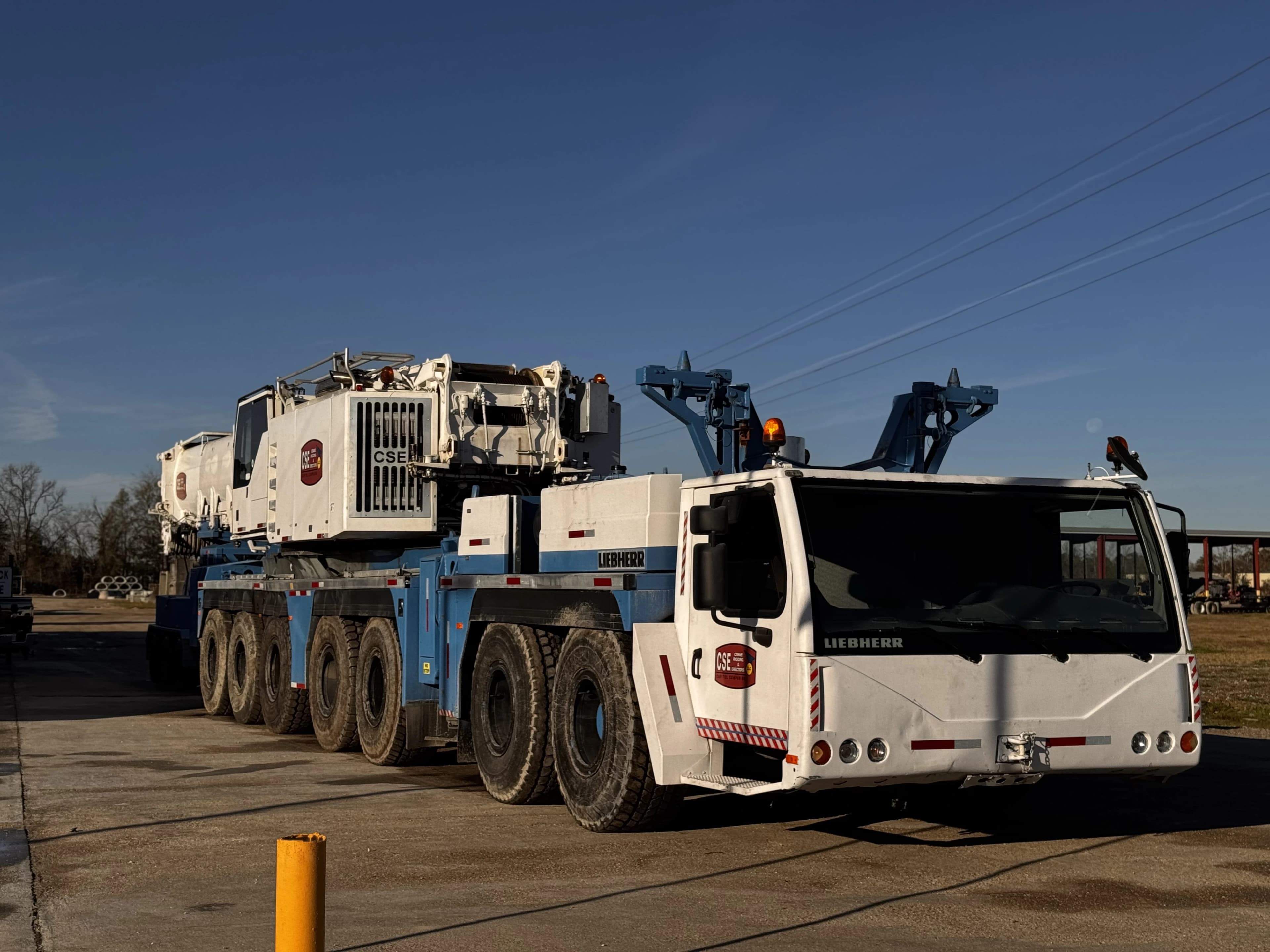 Large capitol companies truck leaving the yard on a clear day