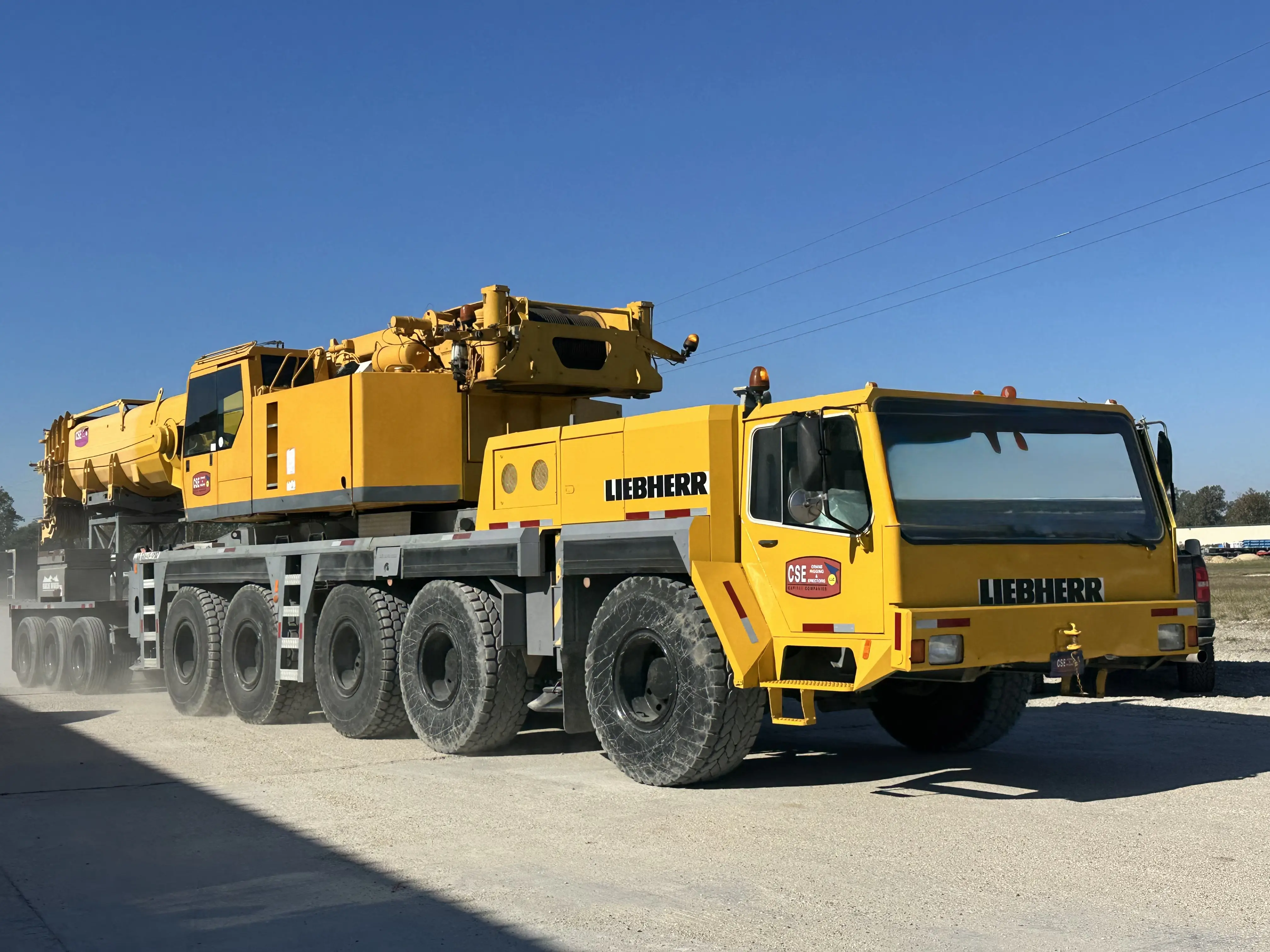 Liebherr crane transporting itself on a empty road