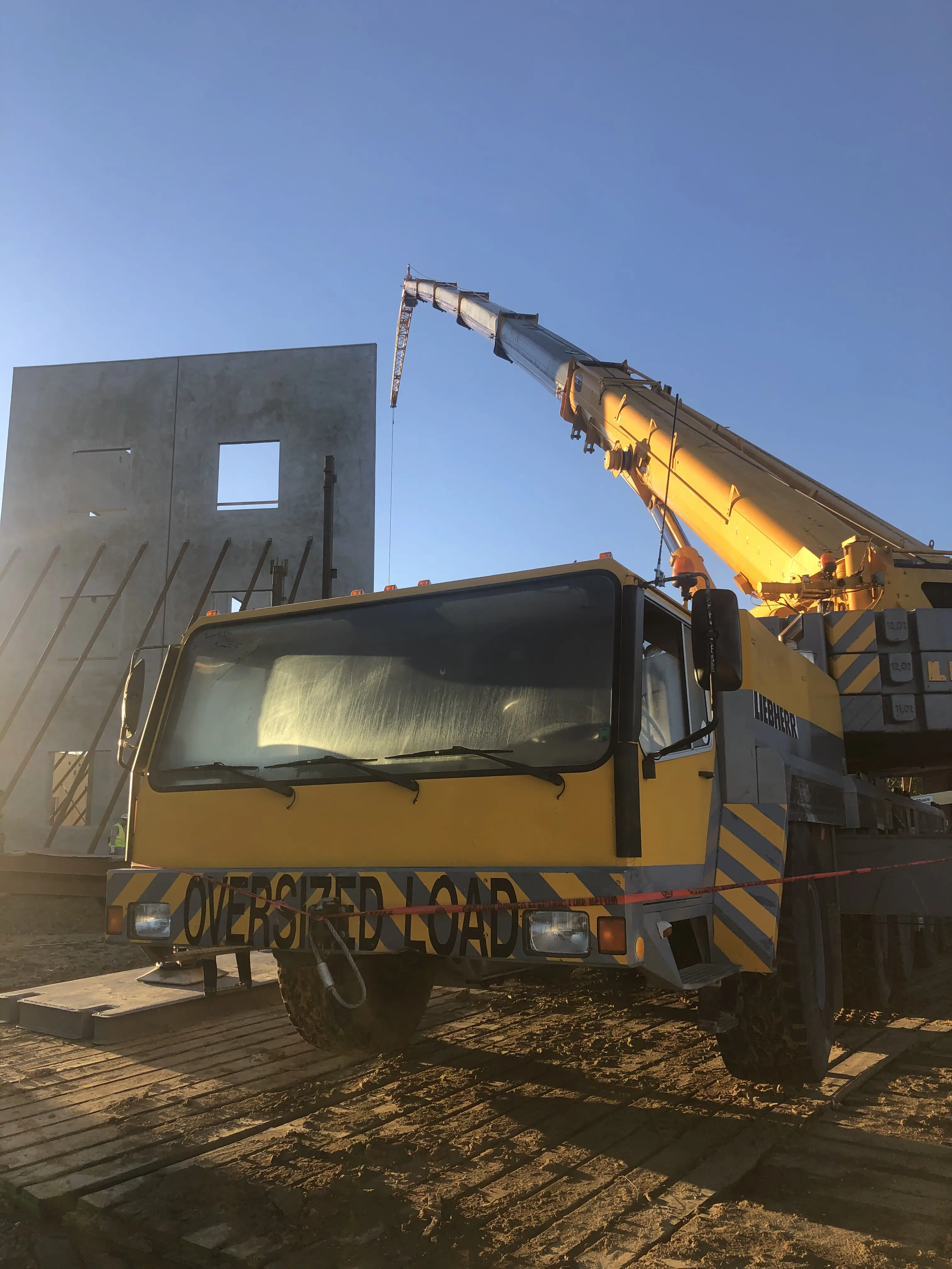 Liebherr crane truck doing tilt up concrete work