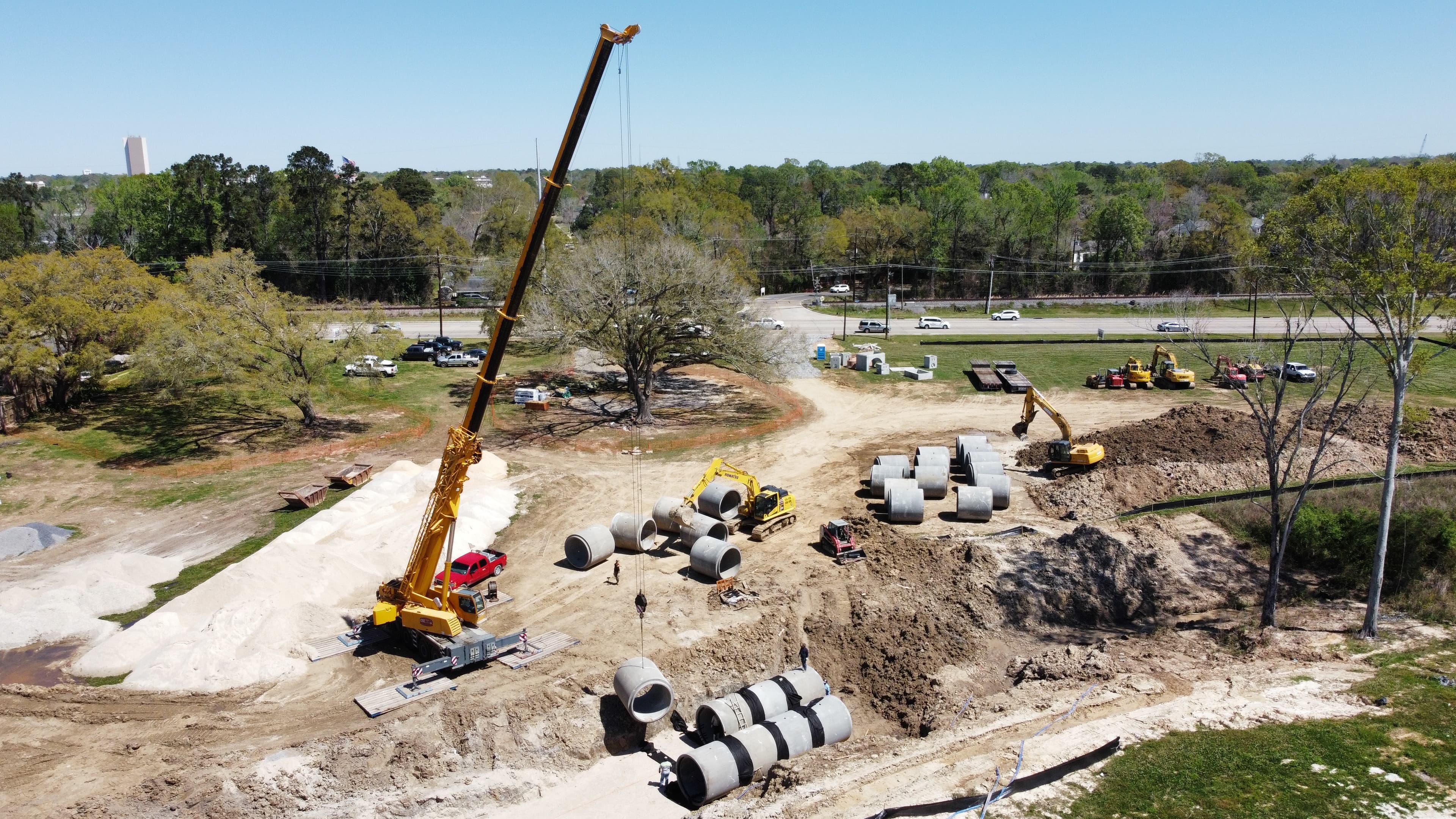 Concrete pipes being set at a jobsite